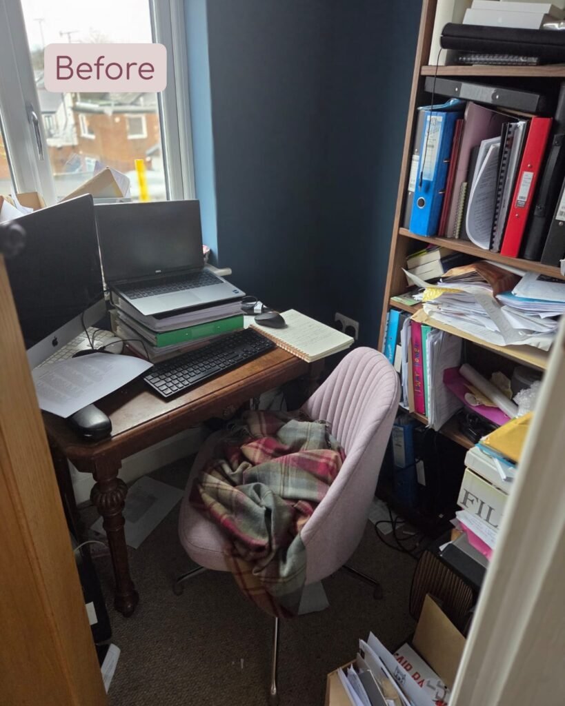 a busy study with paperwork overflowing.
