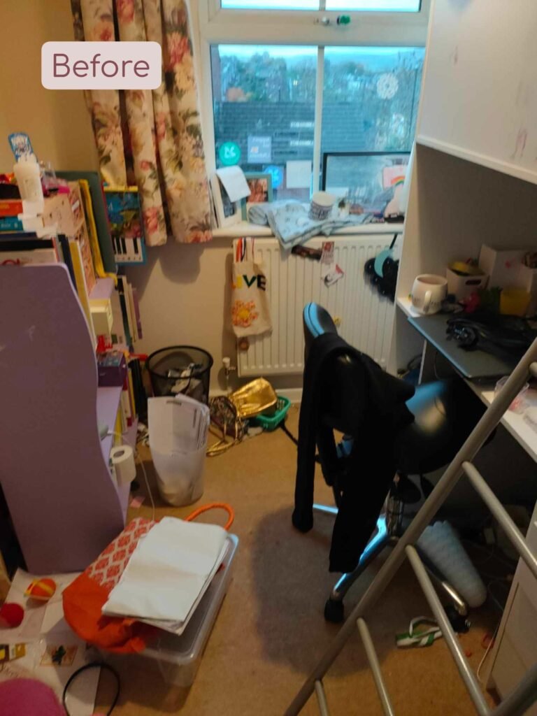 a bedroom with clutter